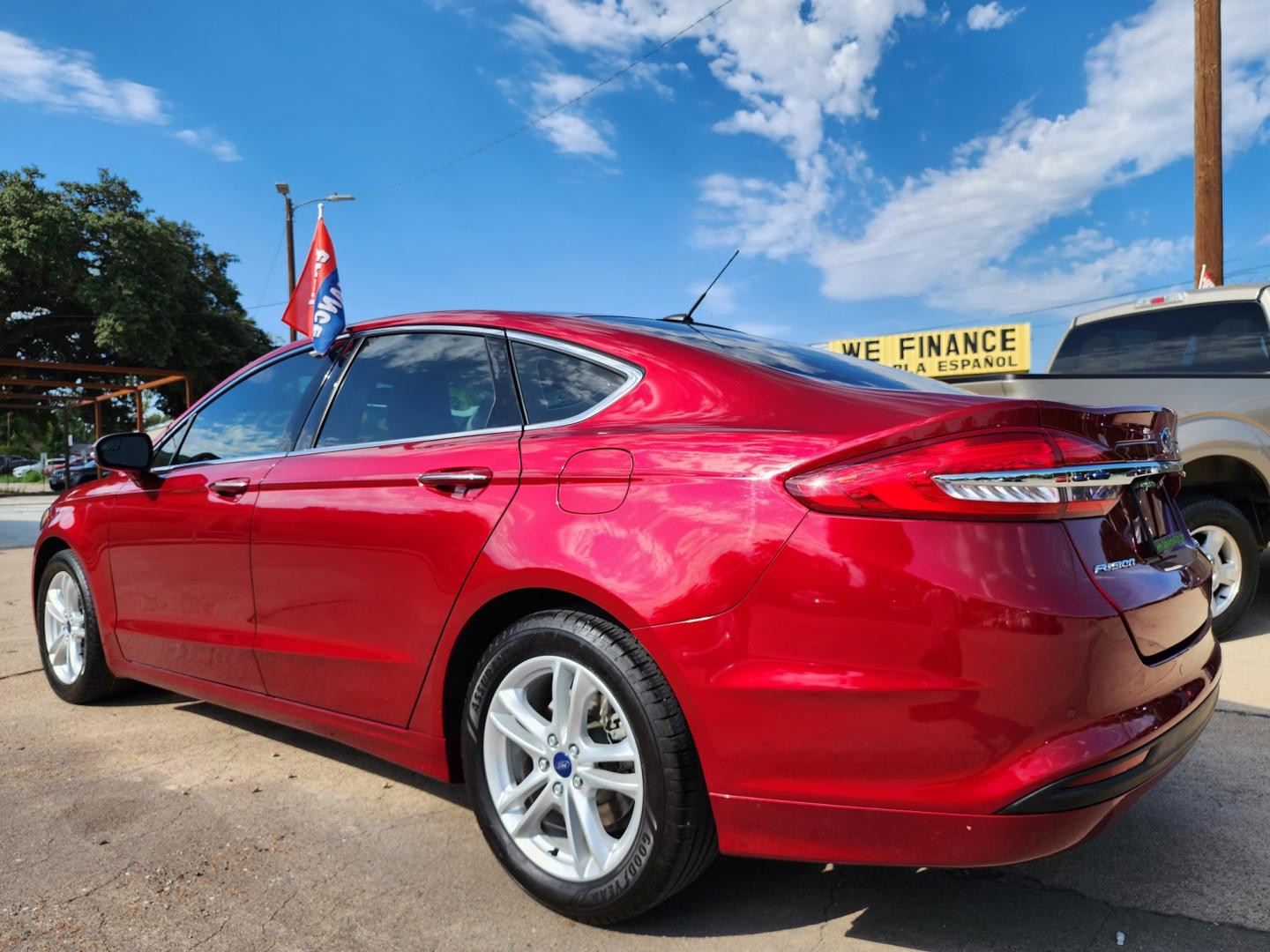 2018 RED Ford Fusion SE (3FA6P0HD2JR) with an 1.5L L4 DOHC 16V engine, 6A transmission, located at 2660 S.Garland Avenue, Garland, TX, 75041, (469) 298-3118, 32.885551, -96.655602 - Welcome to DallasAutos4Less, one of the Premier BUY HERE PAY HERE Dealers in the North Dallas Area. We specialize in financing to people with NO CREDIT or BAD CREDIT. We need proof of income, proof of residence, and a ID. Come buy your new car from us today!! This is a SUPER CLEAN 2018 FORD FUSIO - Photo#5